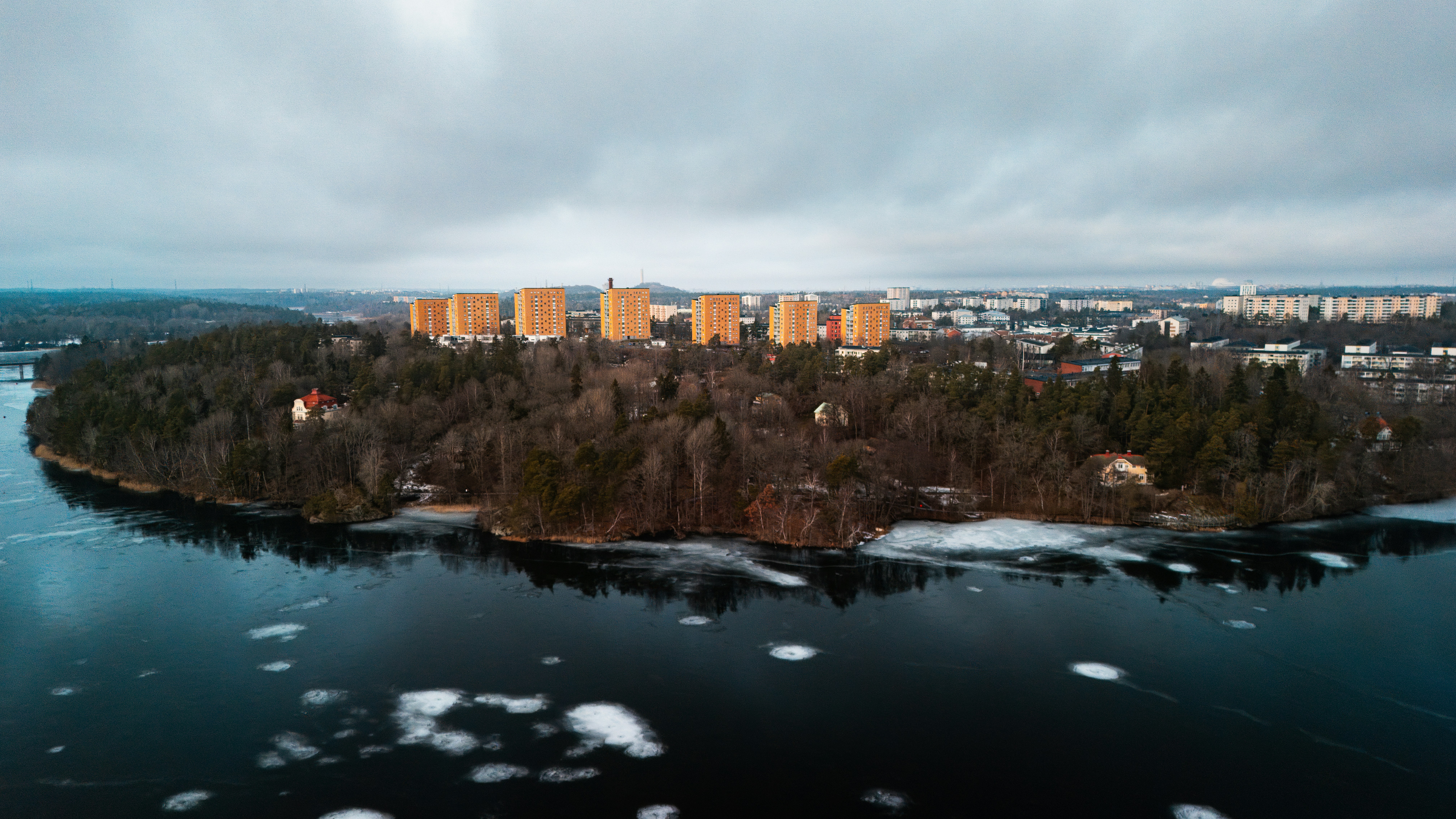 A small island in the middle of a body of water