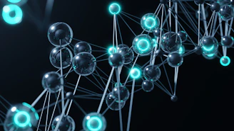 A group of blue and green balls on a black background