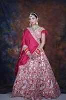 A woman in a red and white bridal gown
