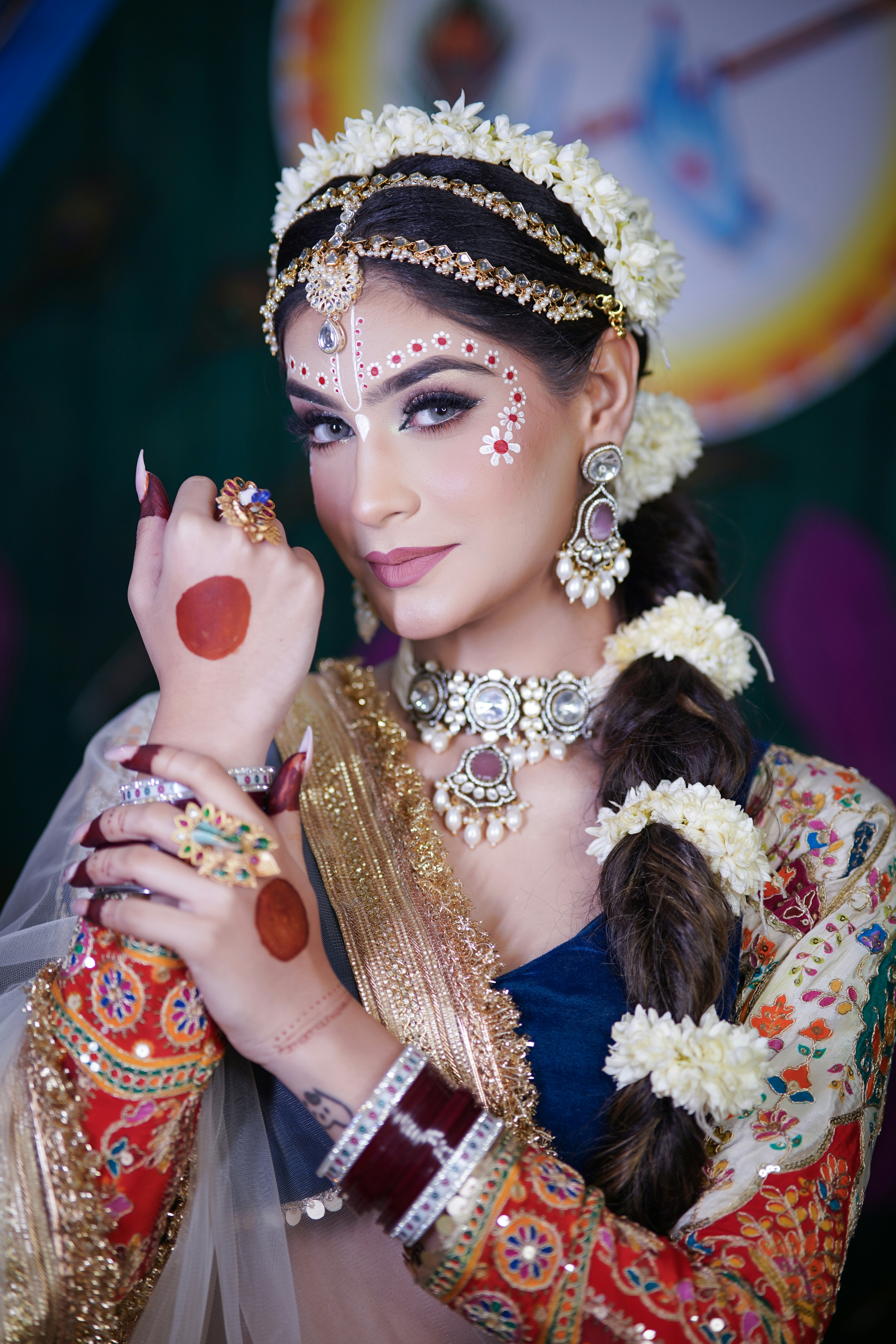 A woman dressed in a traditional indian costume