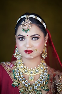 A woman wearing a red and gold outfit