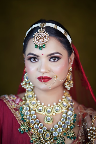 A woman wearing a red and gold outfit