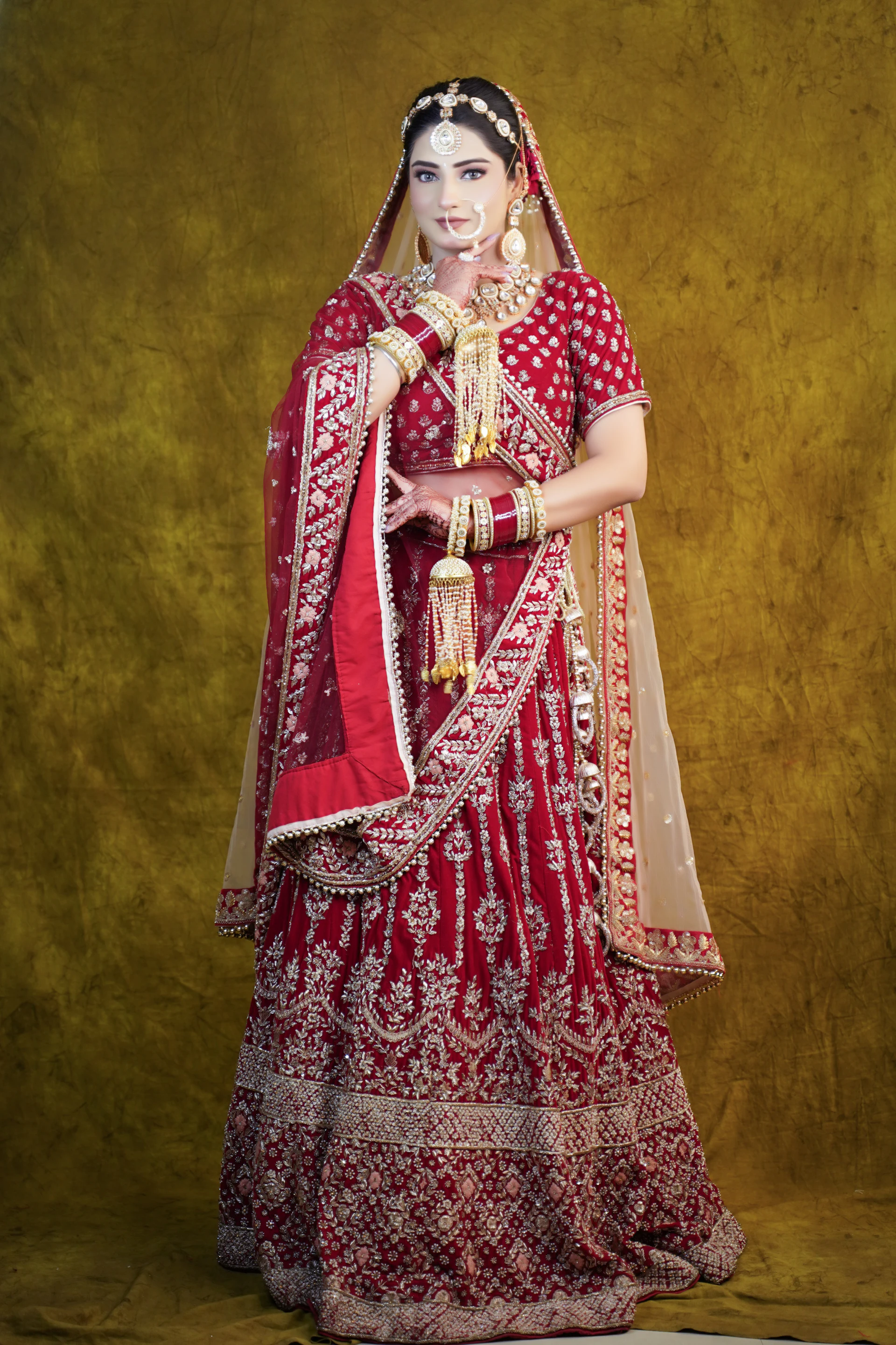 Sindoor red bridal ensemble with gota patti work