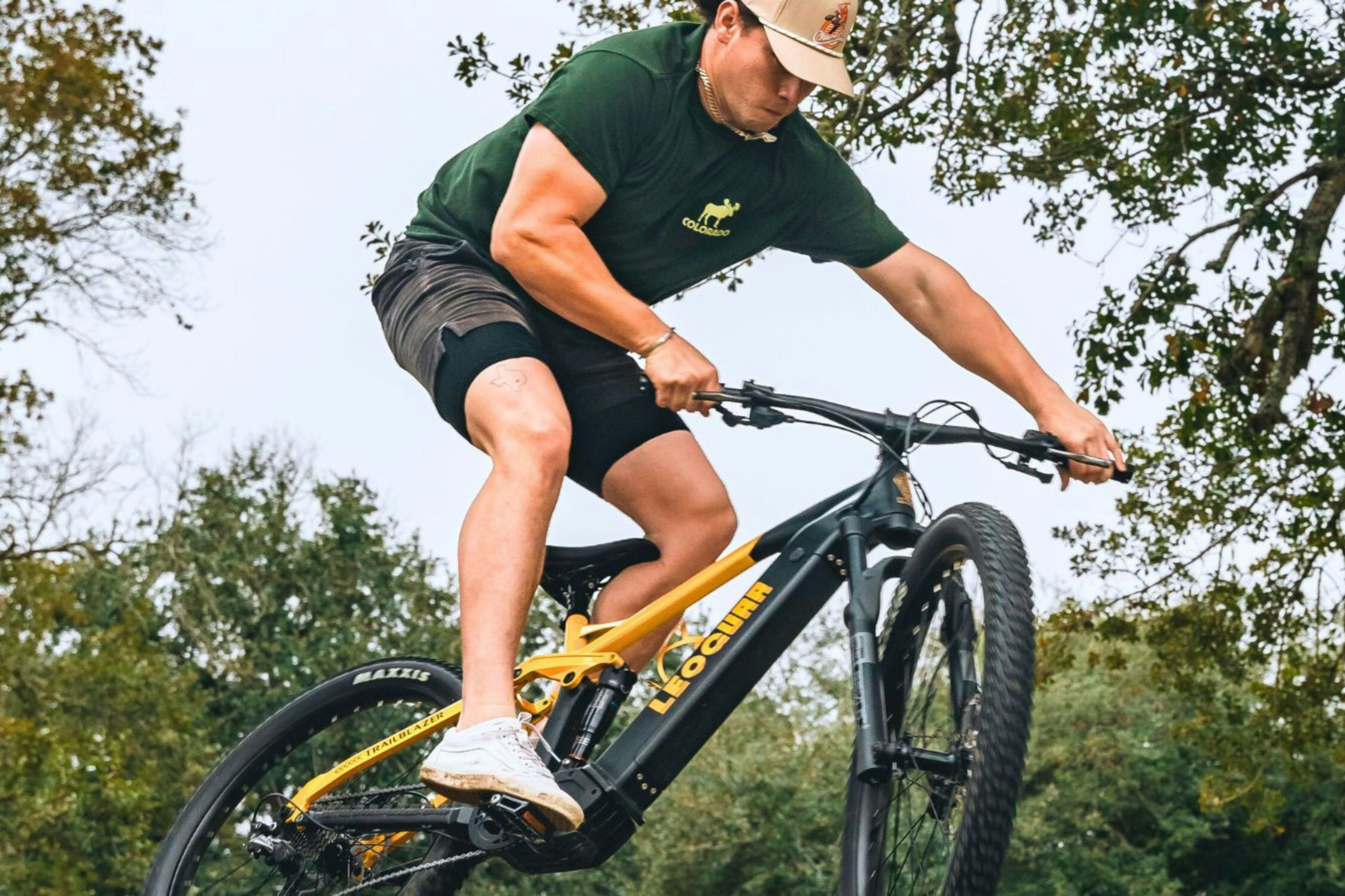 A man riding a bike in the air