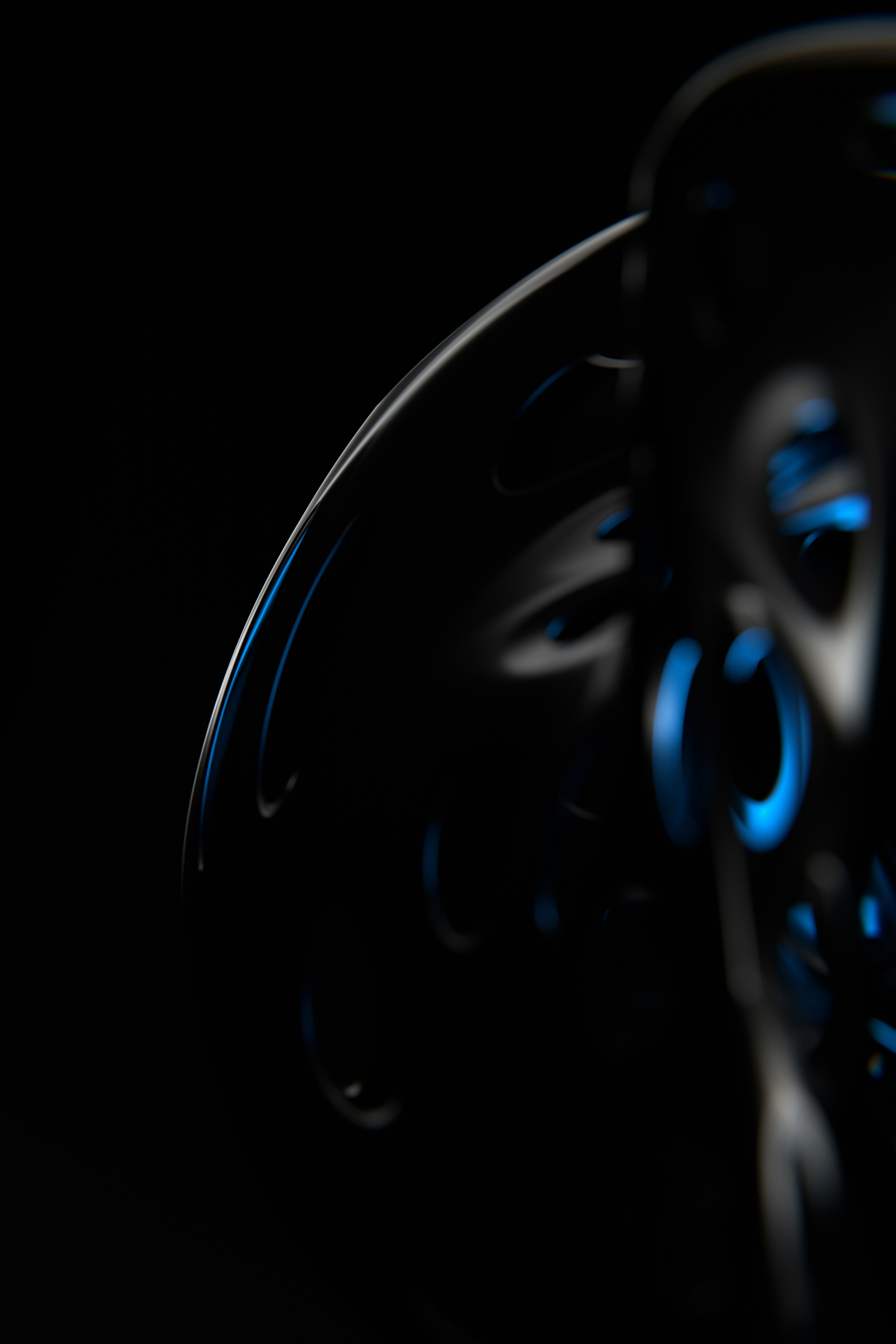 A close up of a black object with blue lights