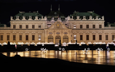 A large building that is lit up at night