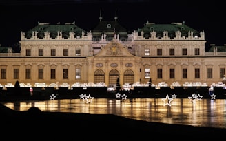 A large building that is lit up at night