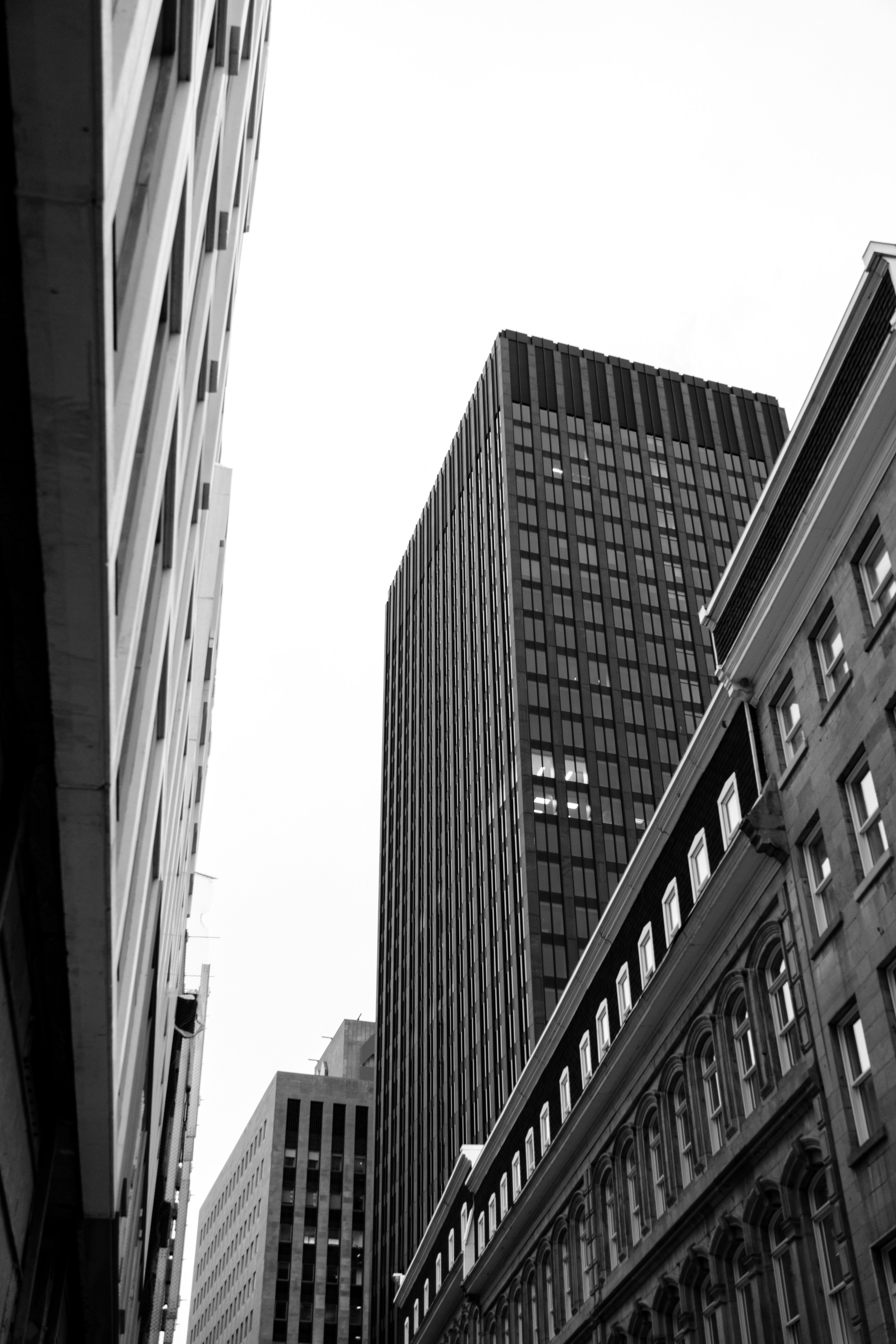 A black and white photo of a city street
