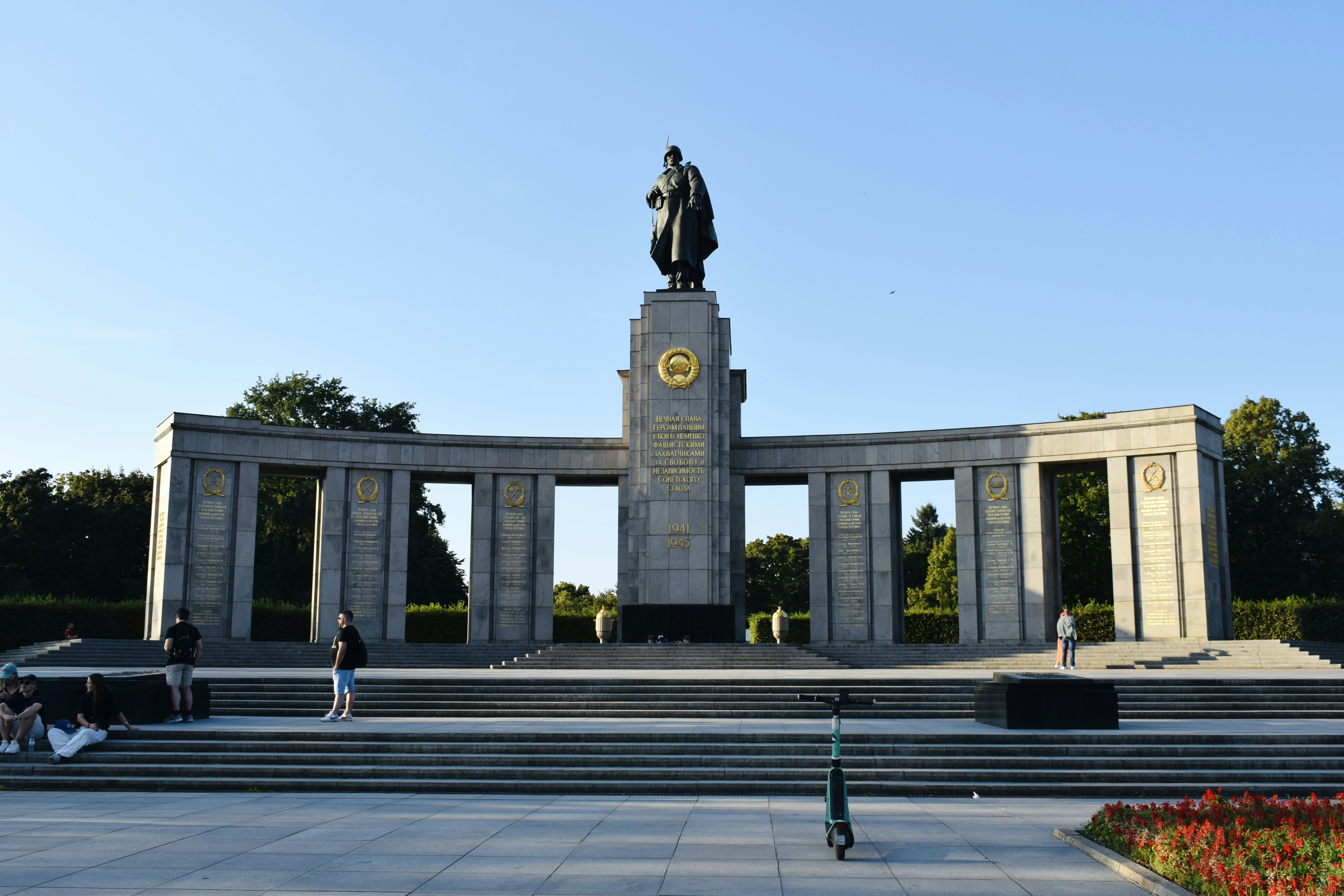 A monument with a statue of a man on top of it