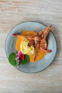 A plate of food on a wooden table