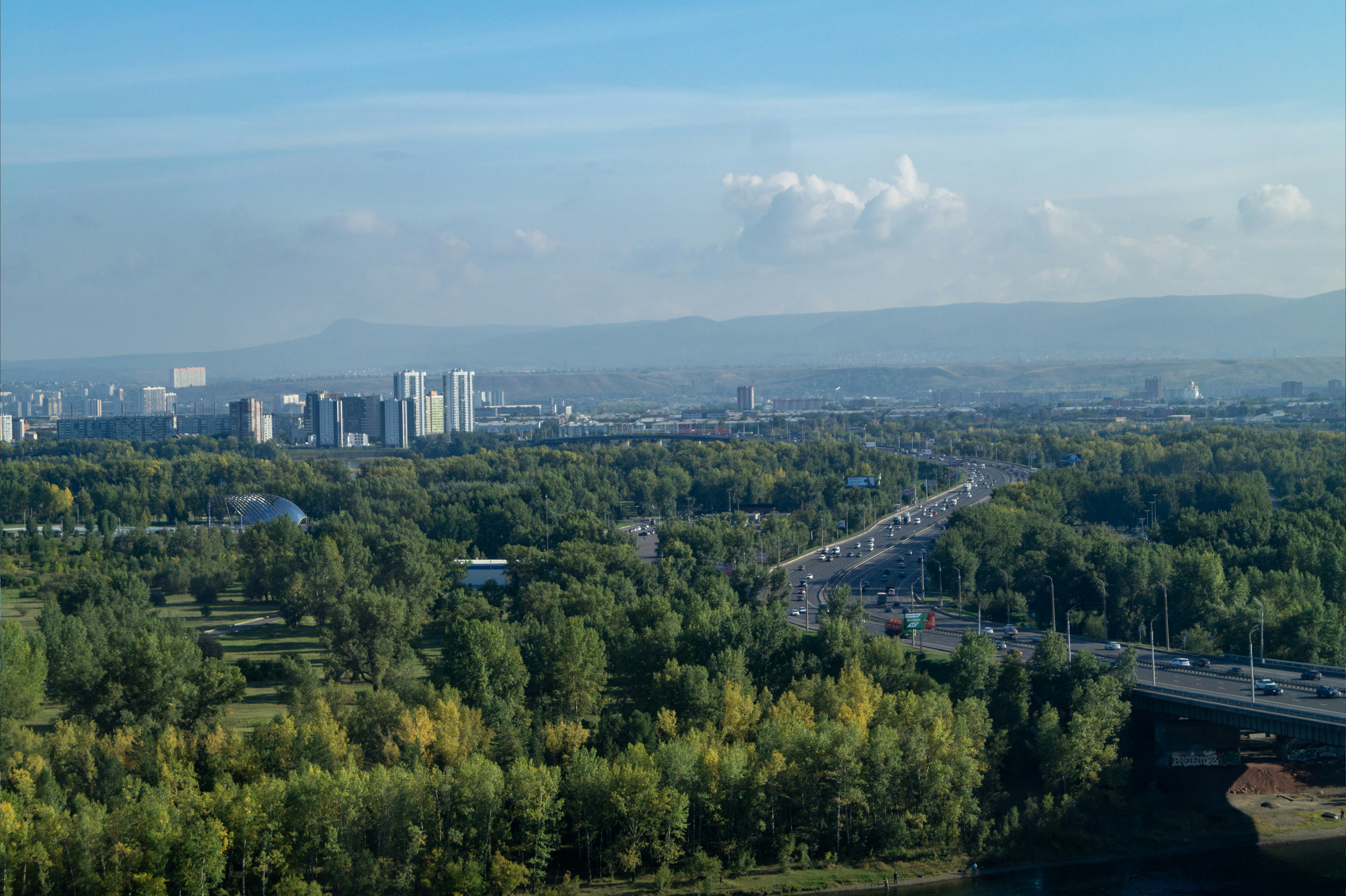 An aerial view of a city and a bridge