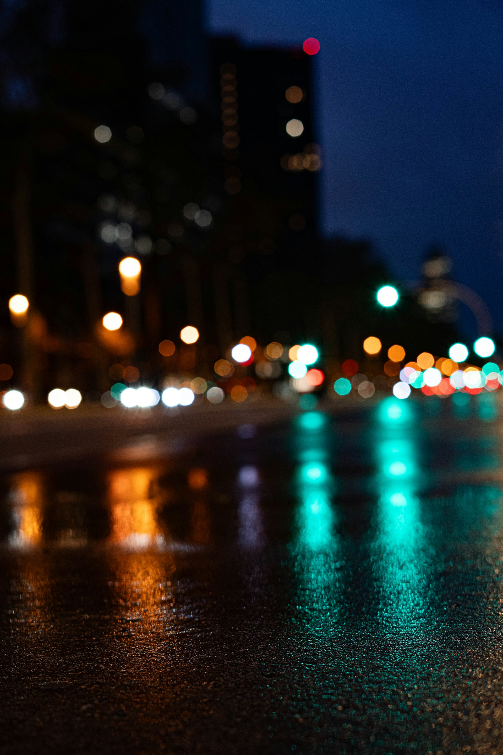A blurry picture of a city street at night