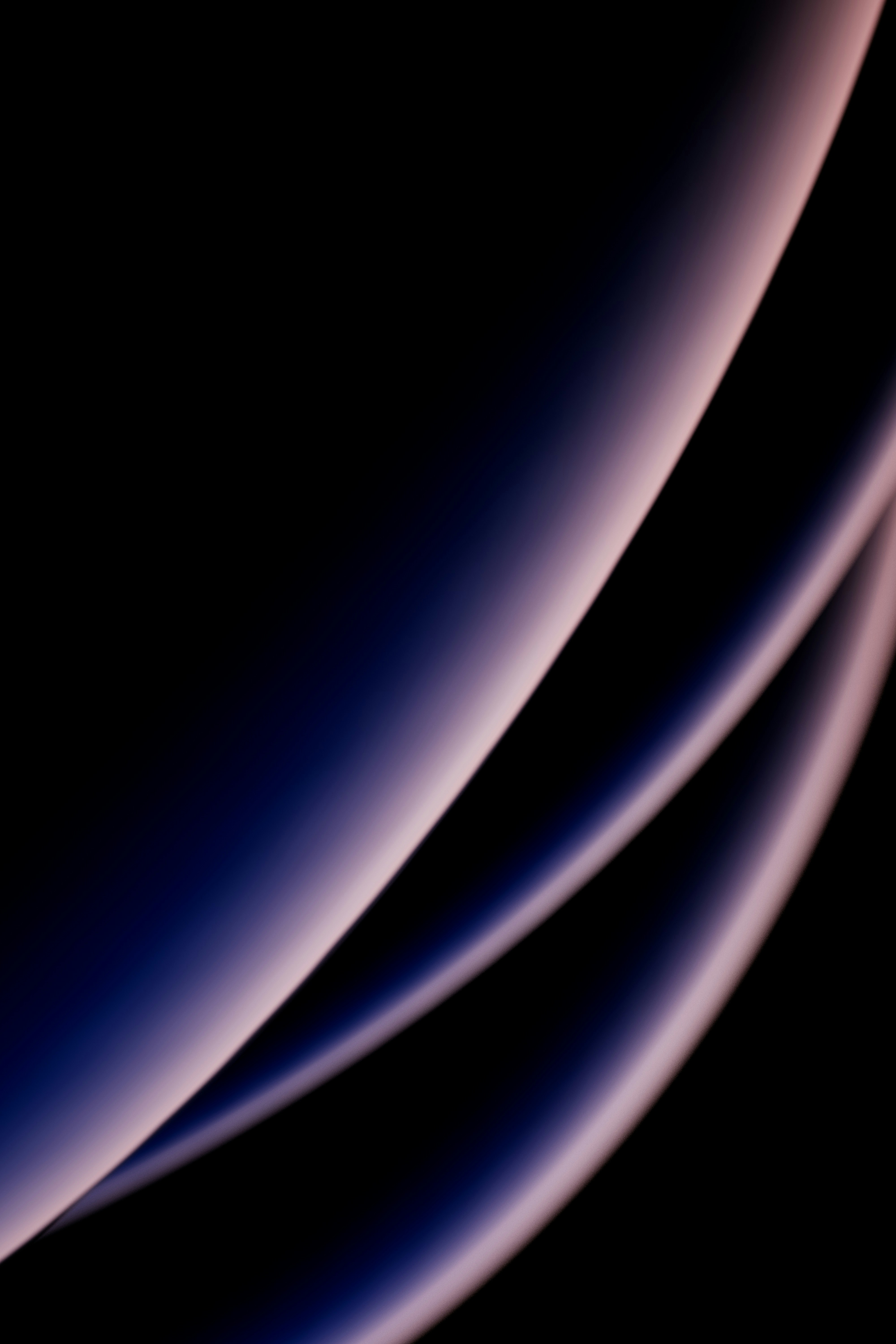 A picture of a black background with a purple swirl