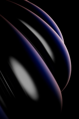 A close up of a cell phone with a black background