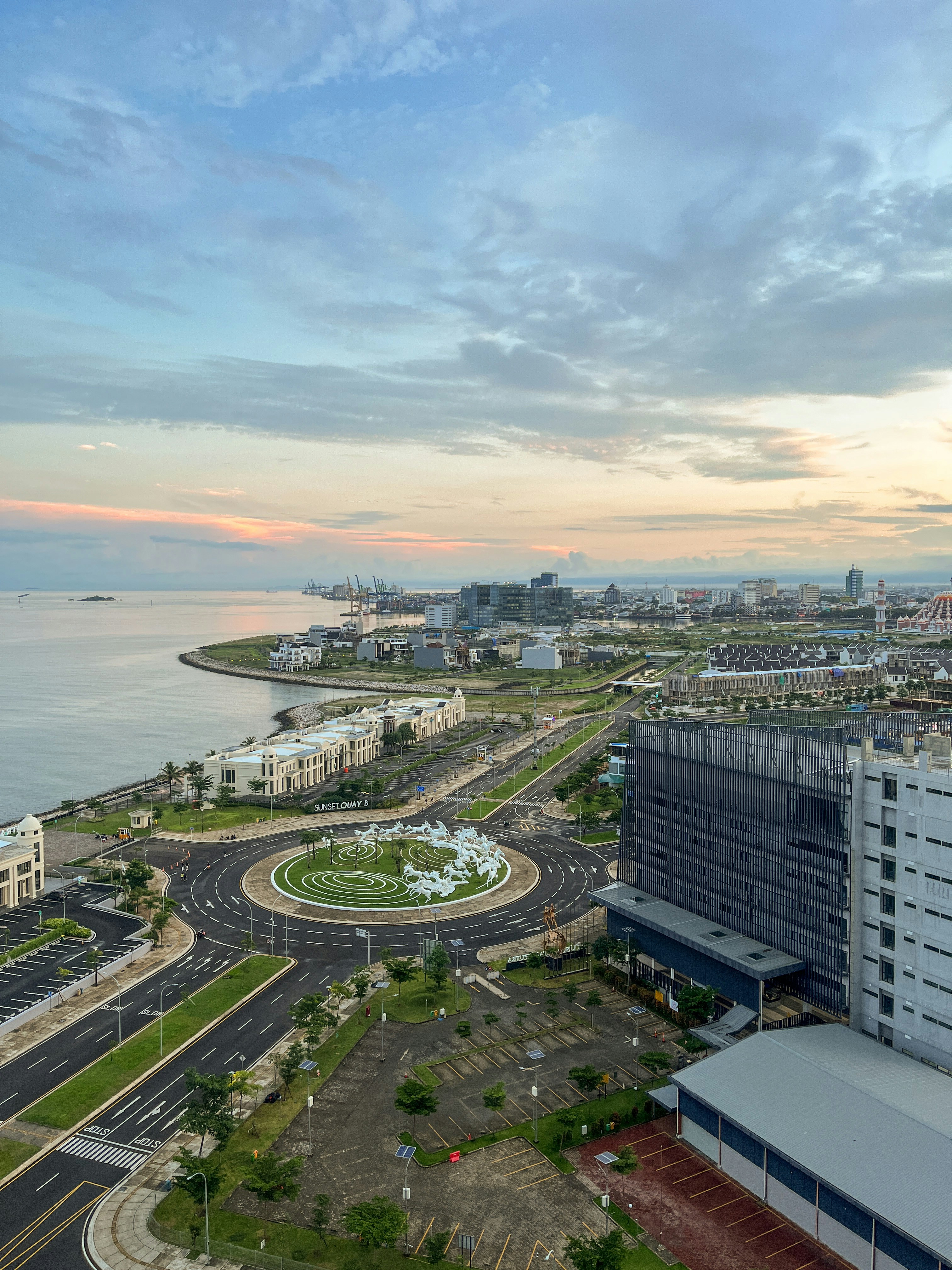 An aerial view of a city and a body of water