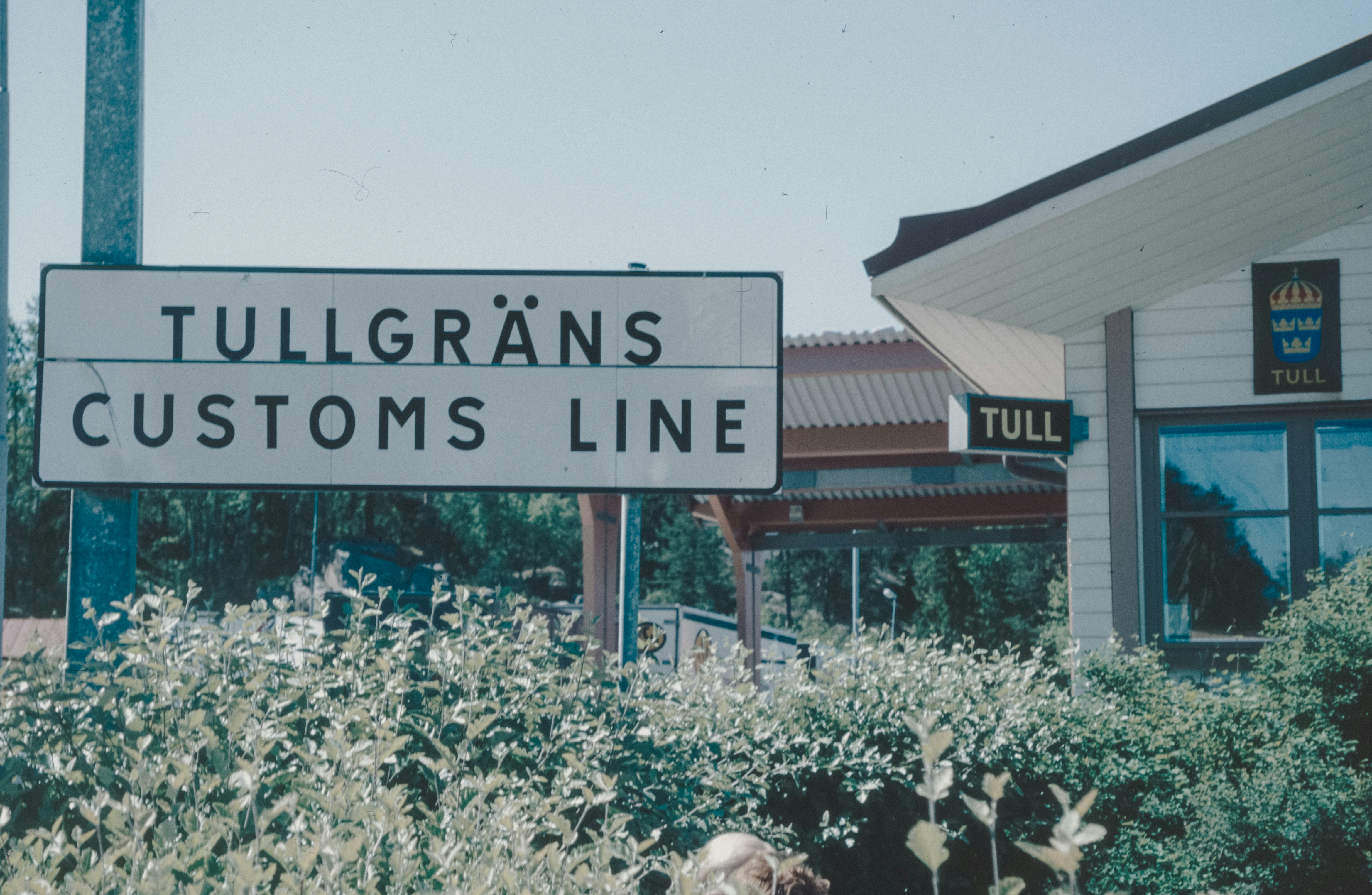 A sign that is in front of a building