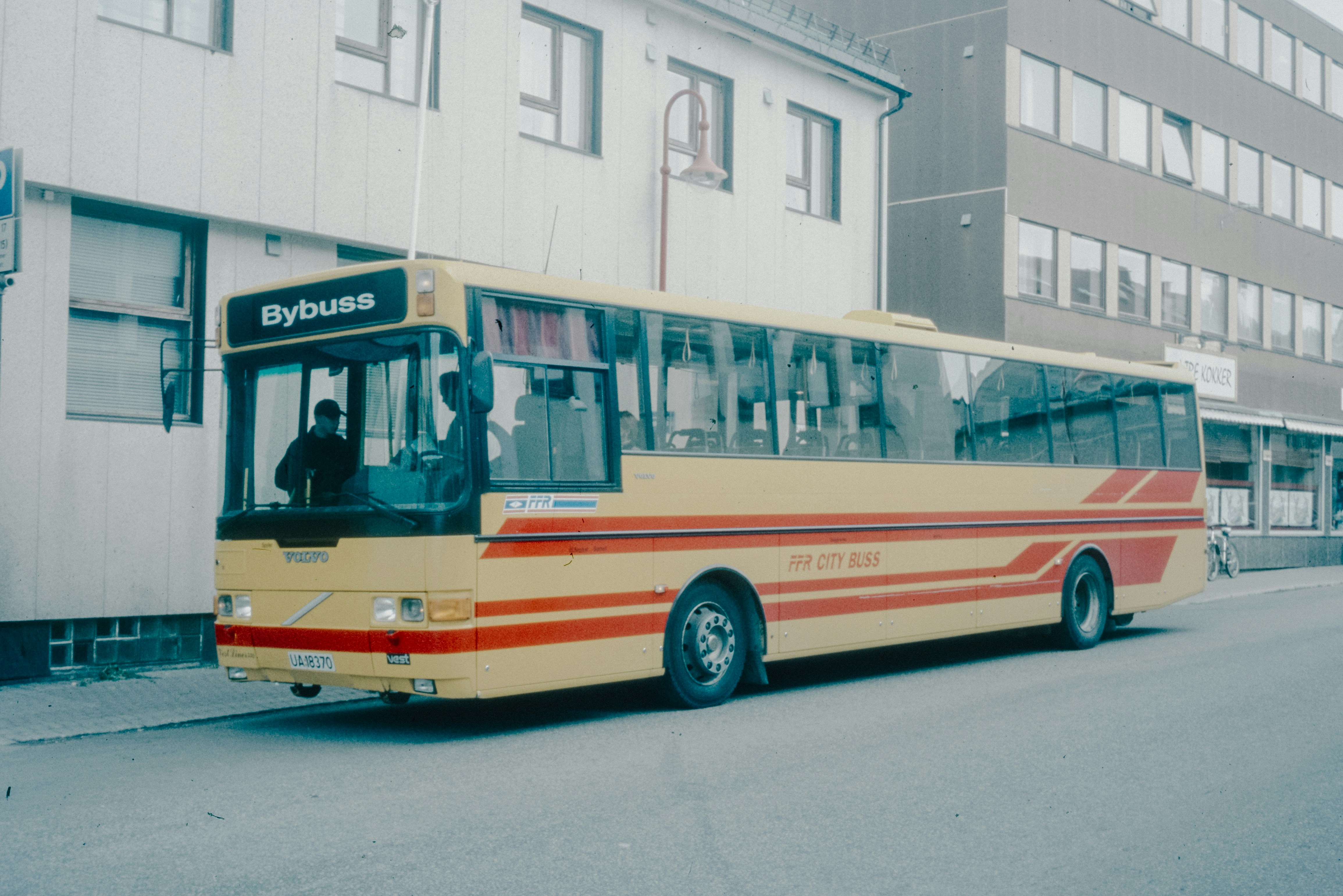 A bus is parked on the side of the road