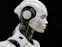 A white robot is standing in front of a black background