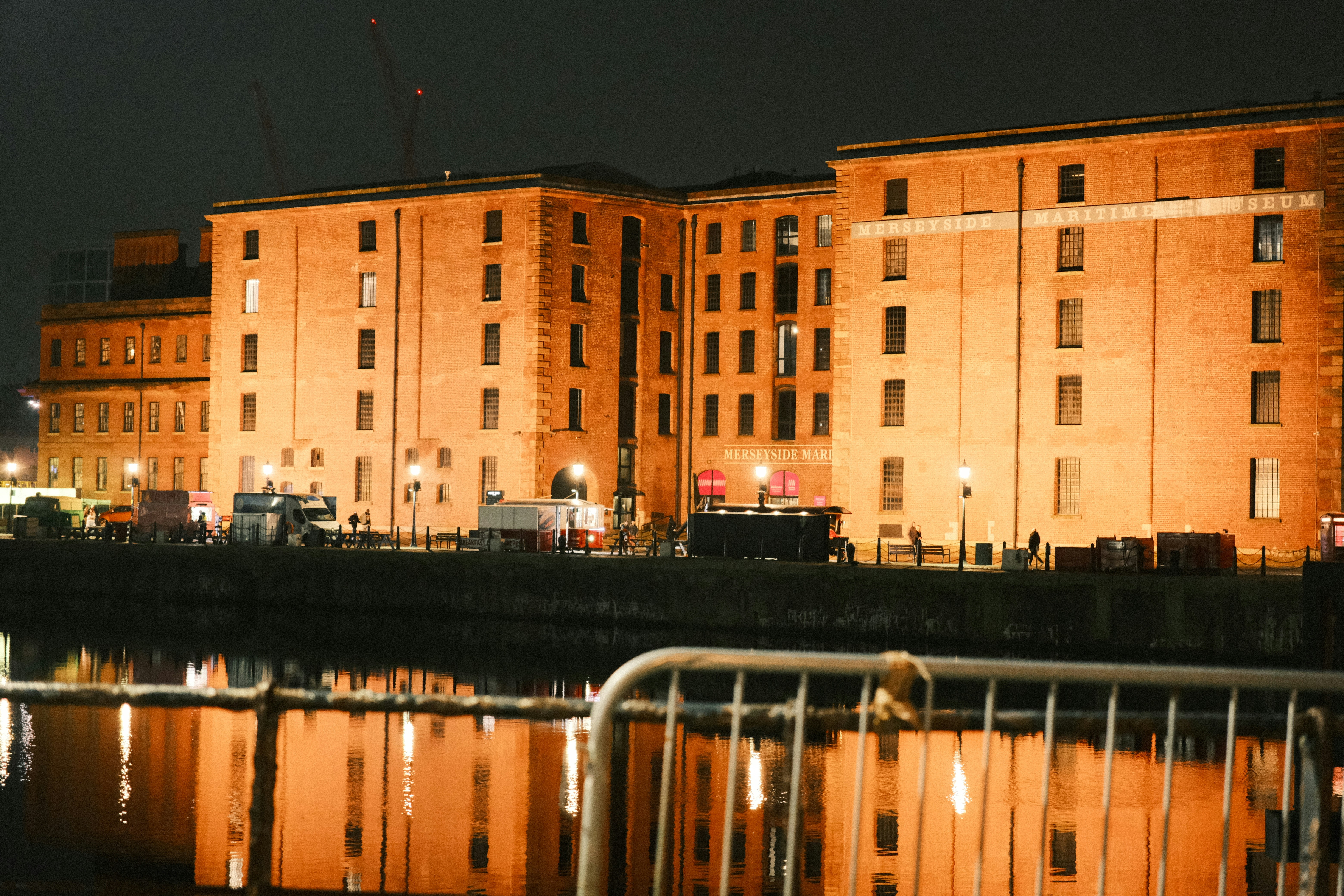 A large building sitting next to a body of water