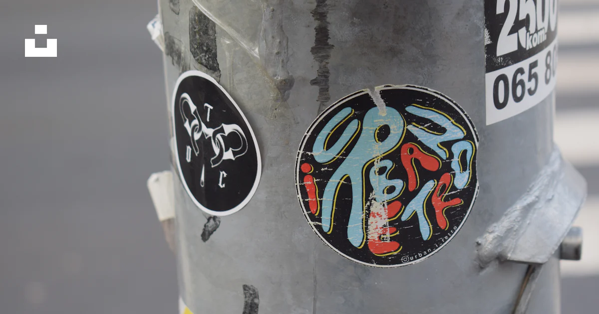 Hydrant Sticker A close up of a fire hydrant with stickers on it photo – Free Sticker ...