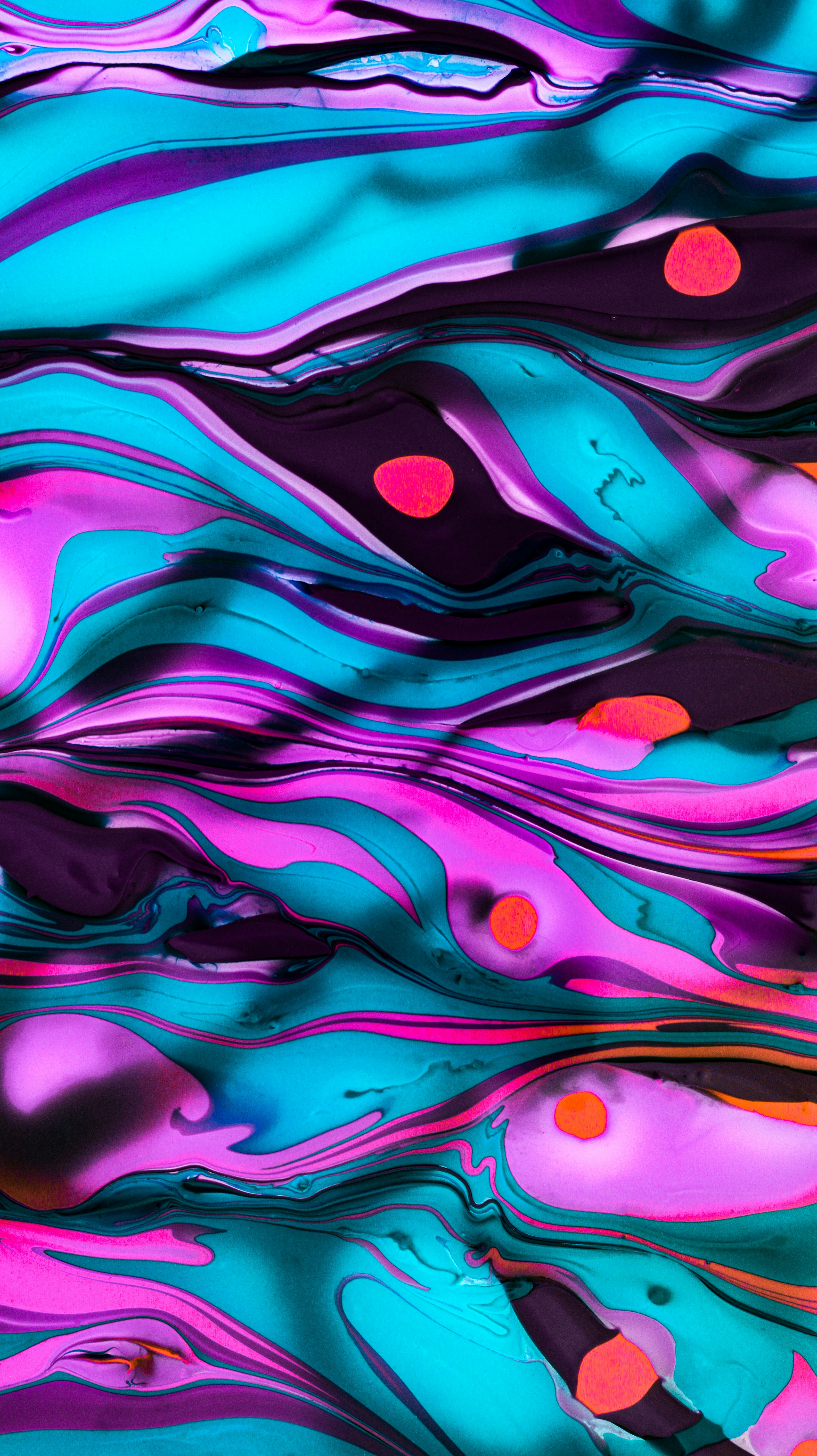 An abstract painting of blue, pink, and orange