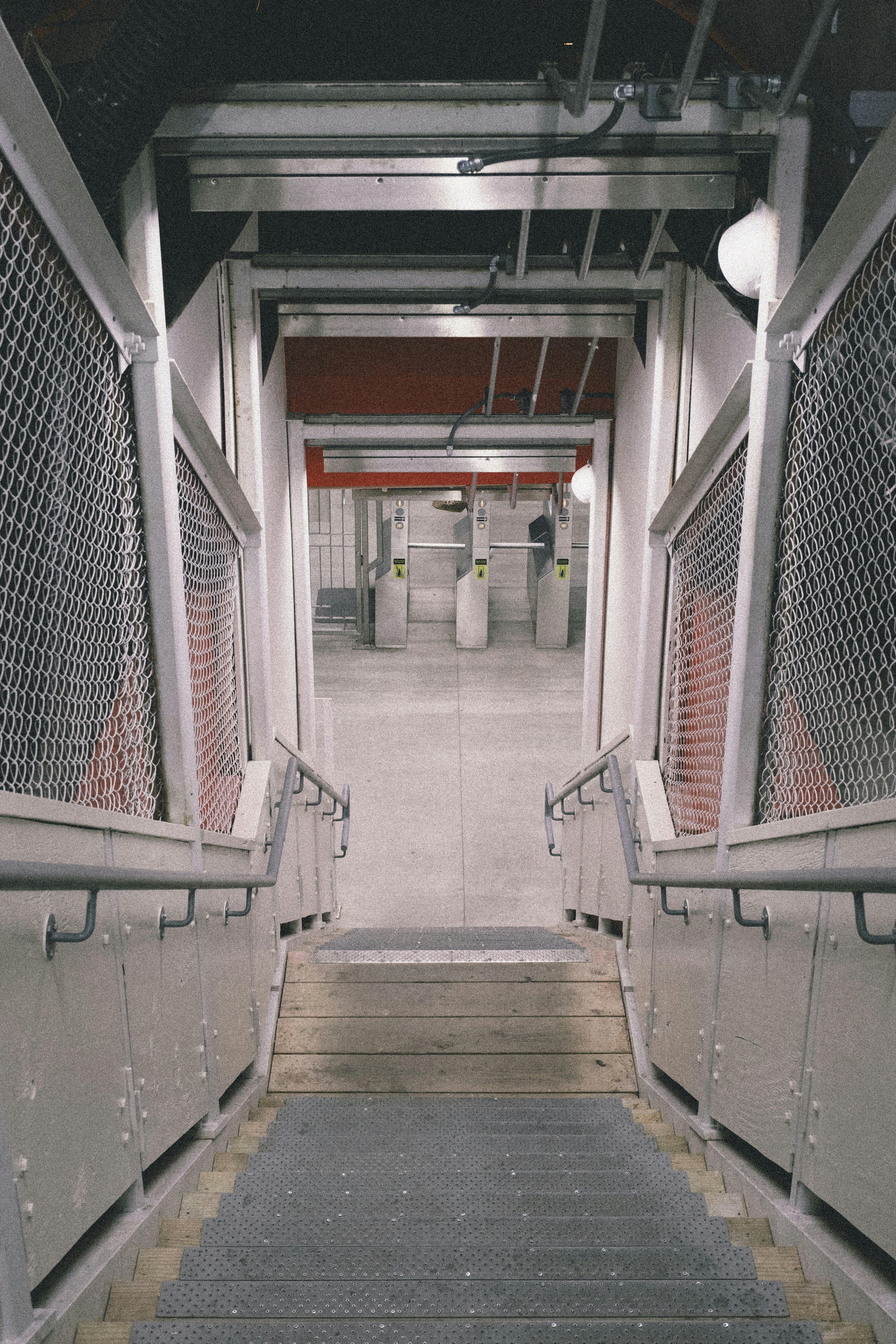 A set of stairs leading to a parking garage
