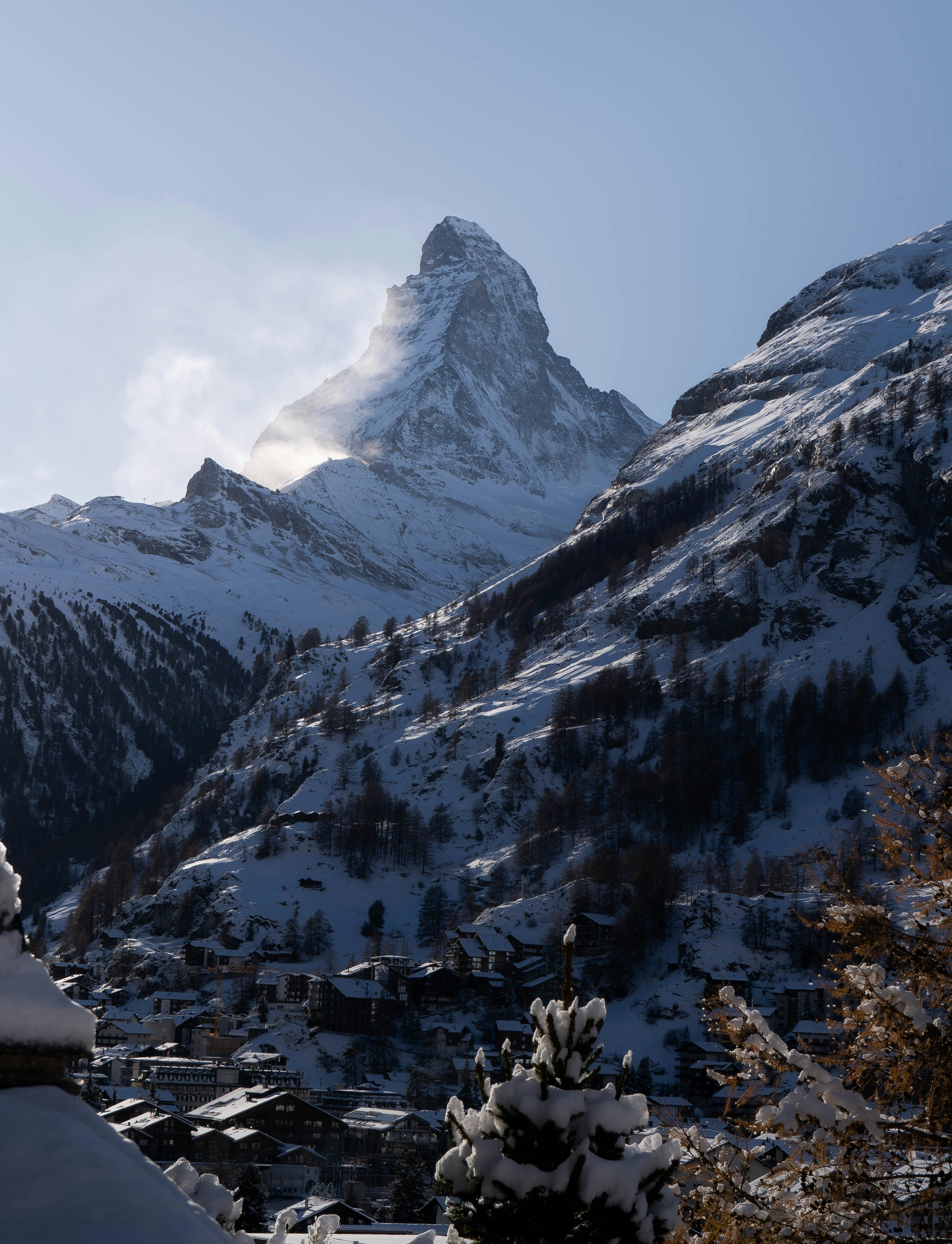 A snow covered mountain range in the distance