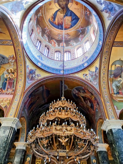 A church with a large painting on the ceiling