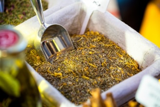 A close up of a container of food with a spoon