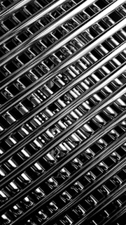 A black and white photo of metal bars