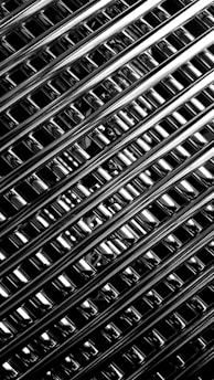 A black and white photo of metal bars