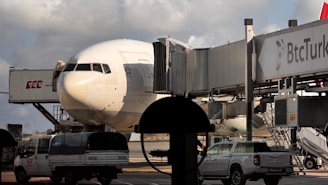 A large jetliner sitting on top of an airport tarmac