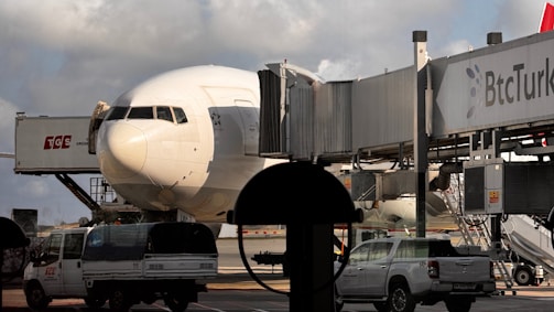 A large jetliner sitting on top of an airport tarmac