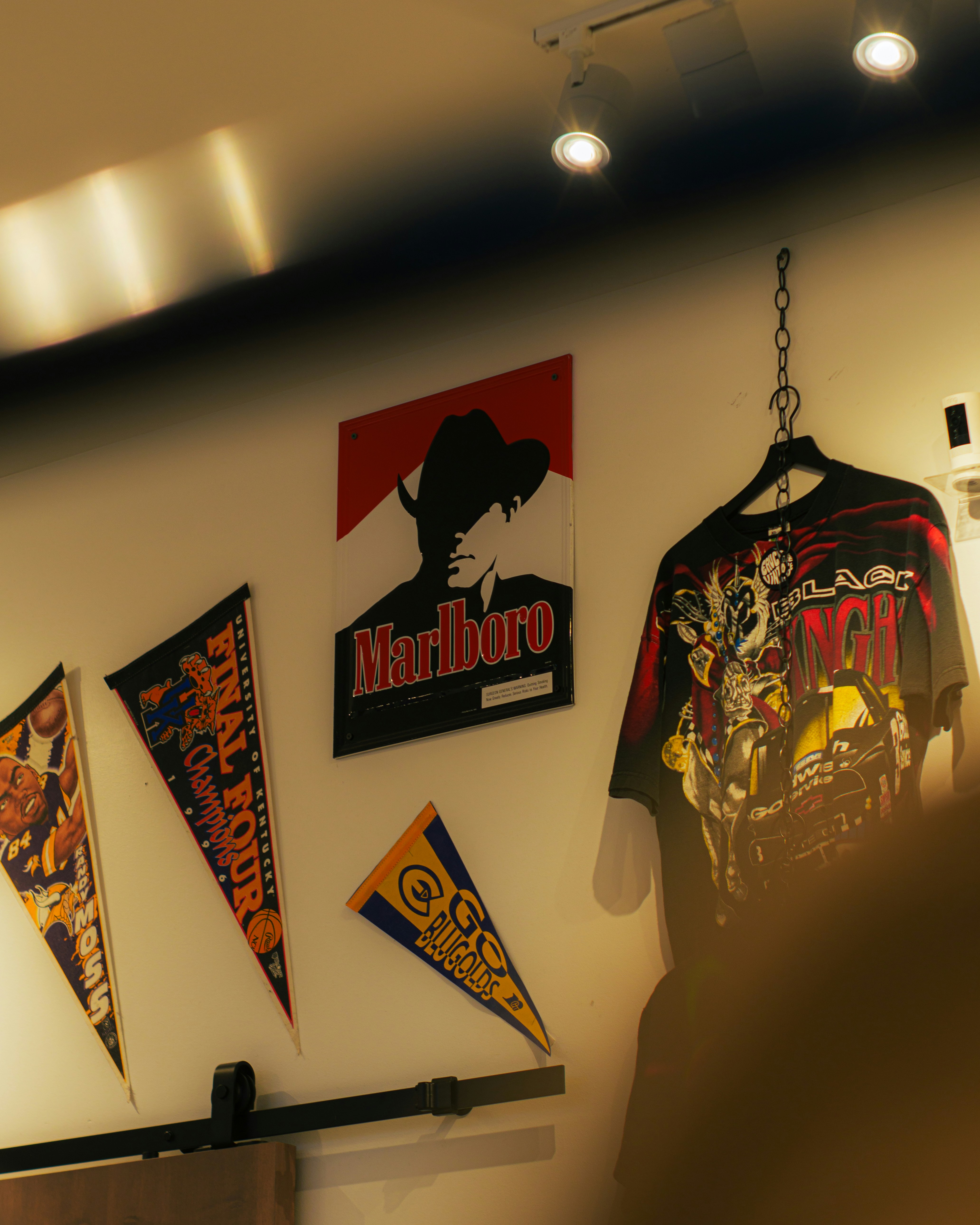 A group of flags hanging on a wall