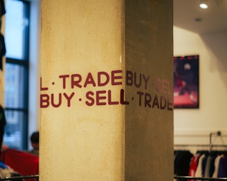 A sign that says i trade buy sell trade