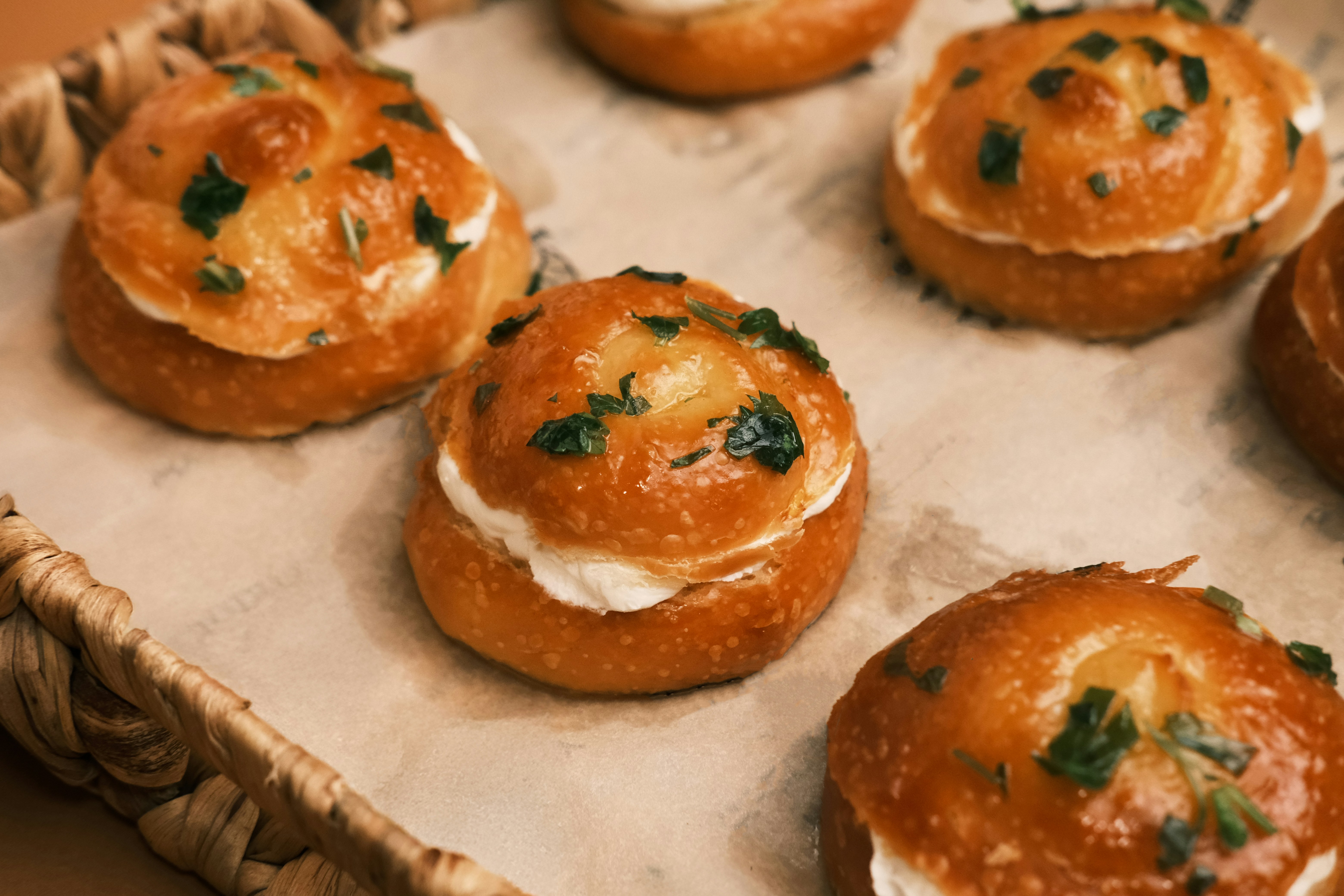 Golden bread rolls in basket
