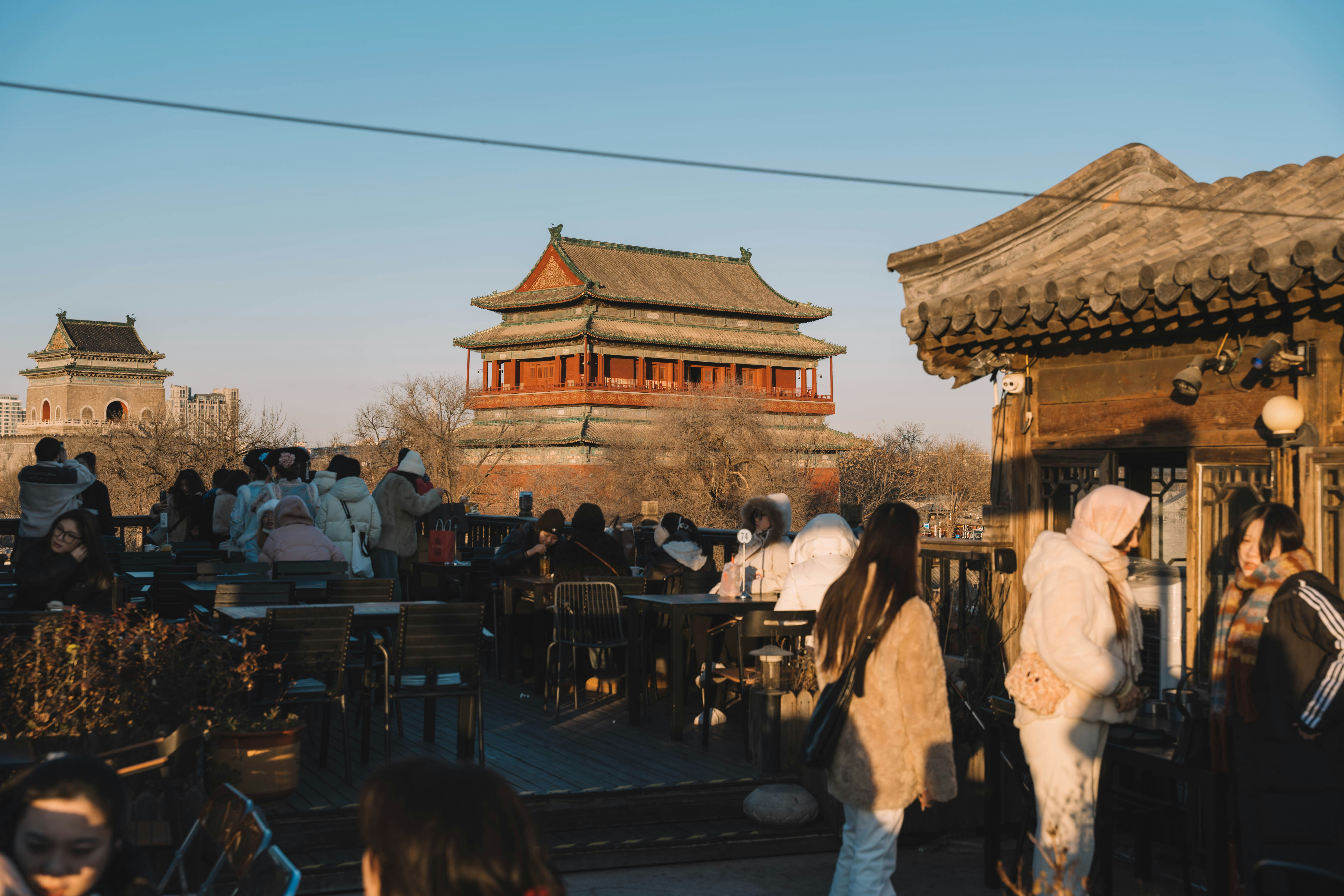 A crowd of people standing around a building