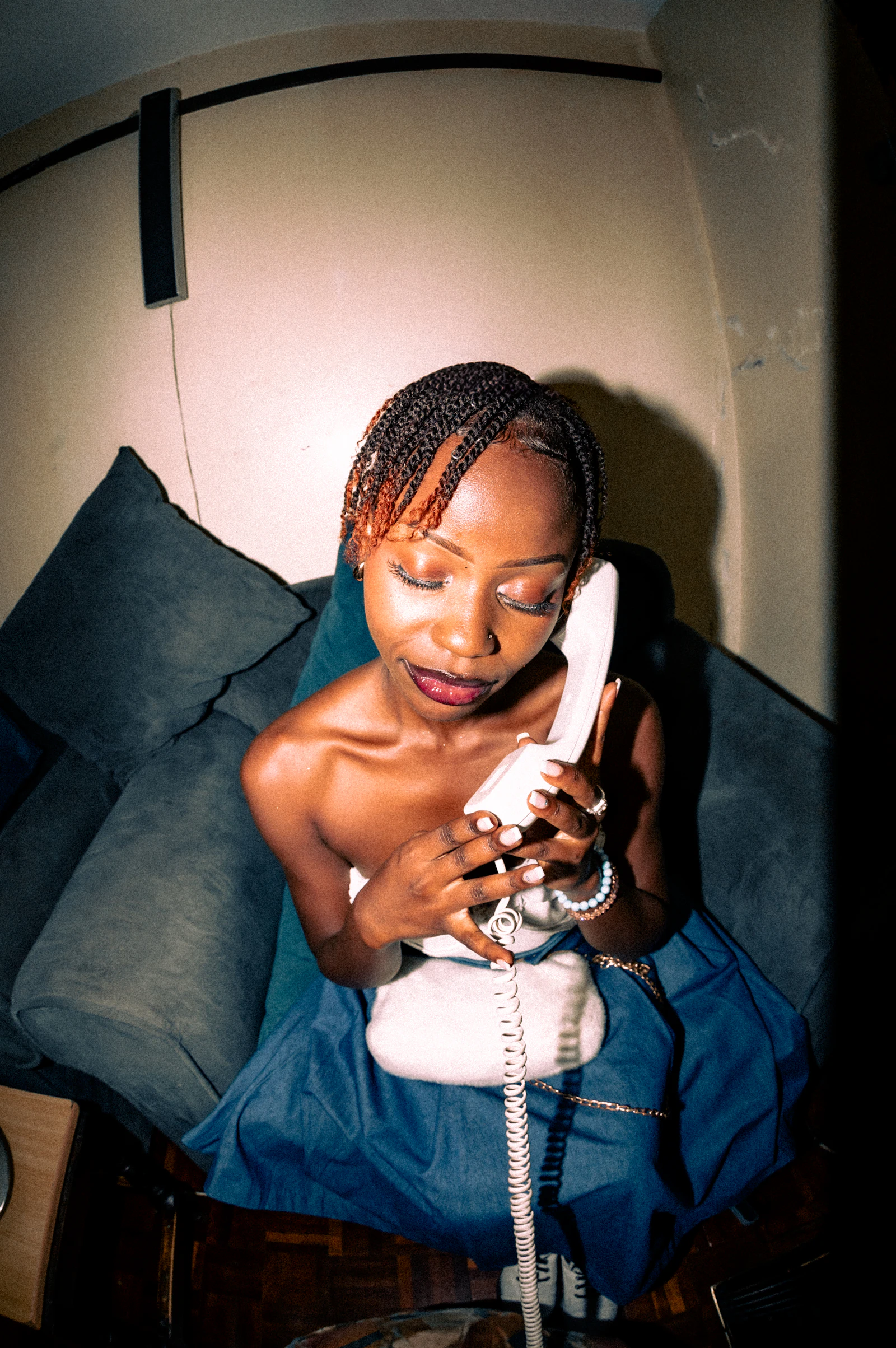 A woman on the phone at home