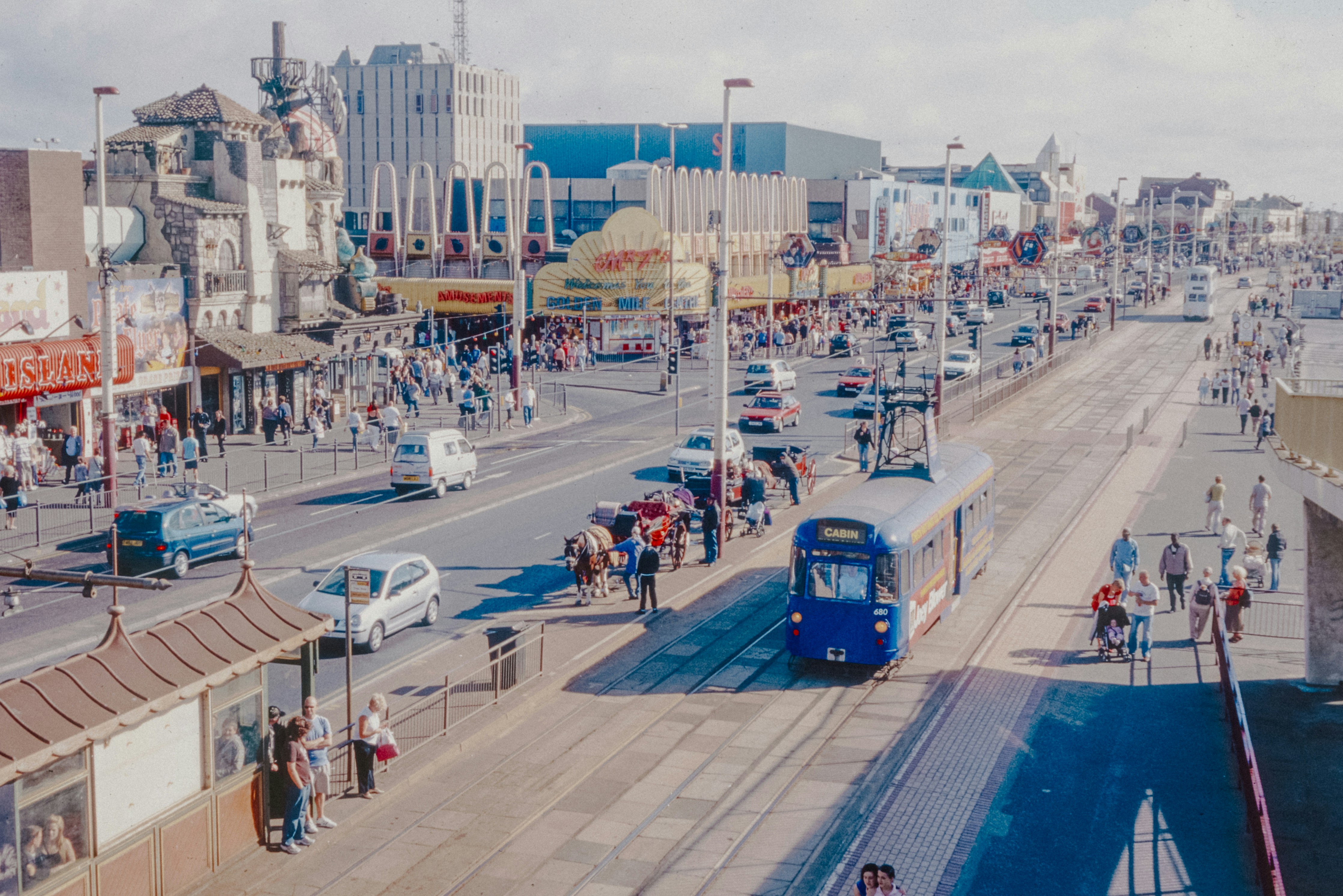A busy city street filled with lots of traffic