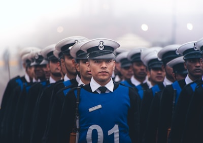 A group of uniformed men standing next to each other