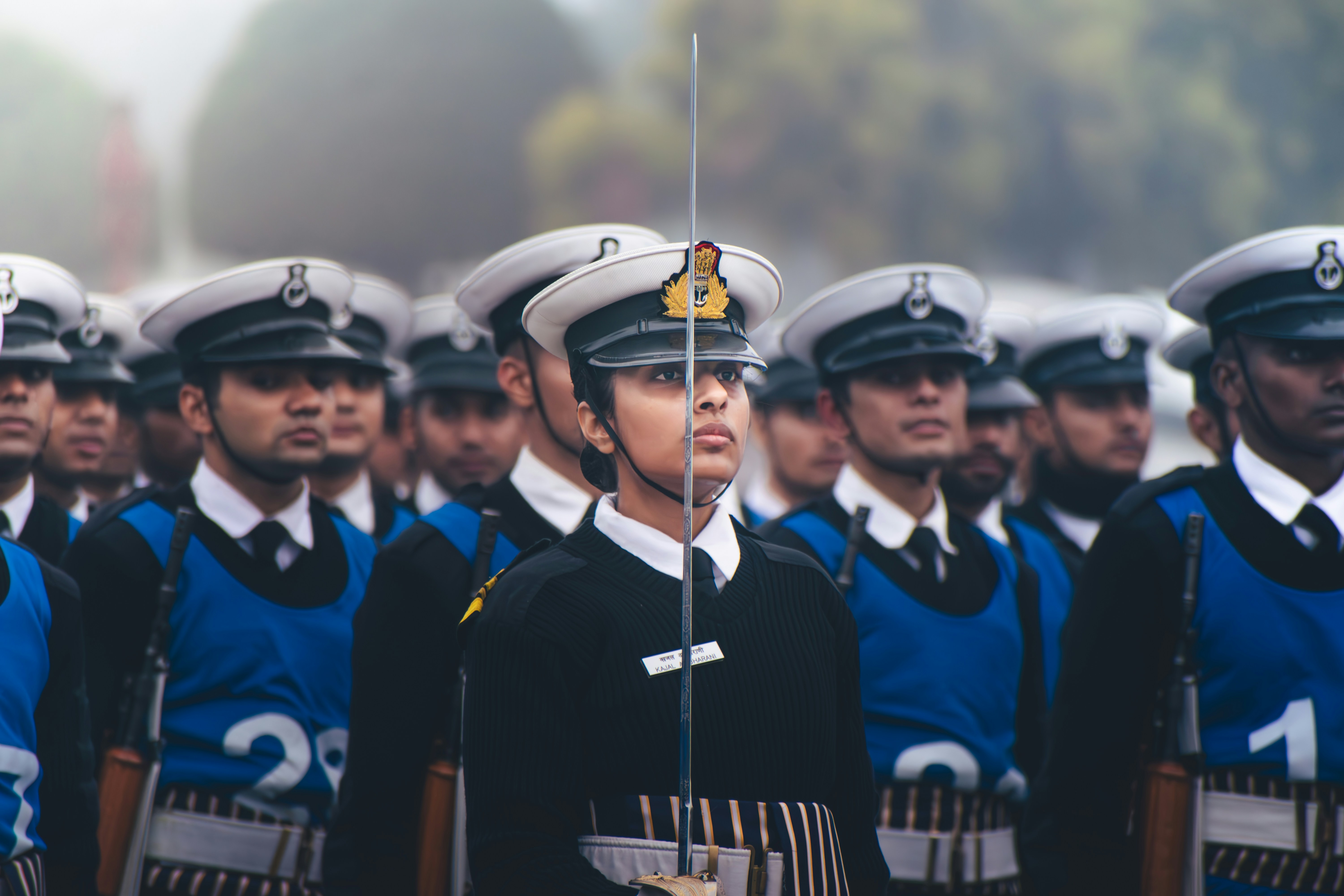 A group of people in uniform standing next to each other