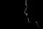 A silhouette of a person in the dark