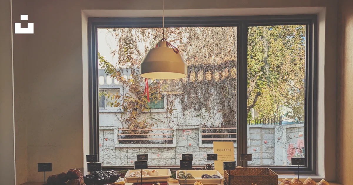 A table filled with lots of food next to a window photo – Free Seoul ...