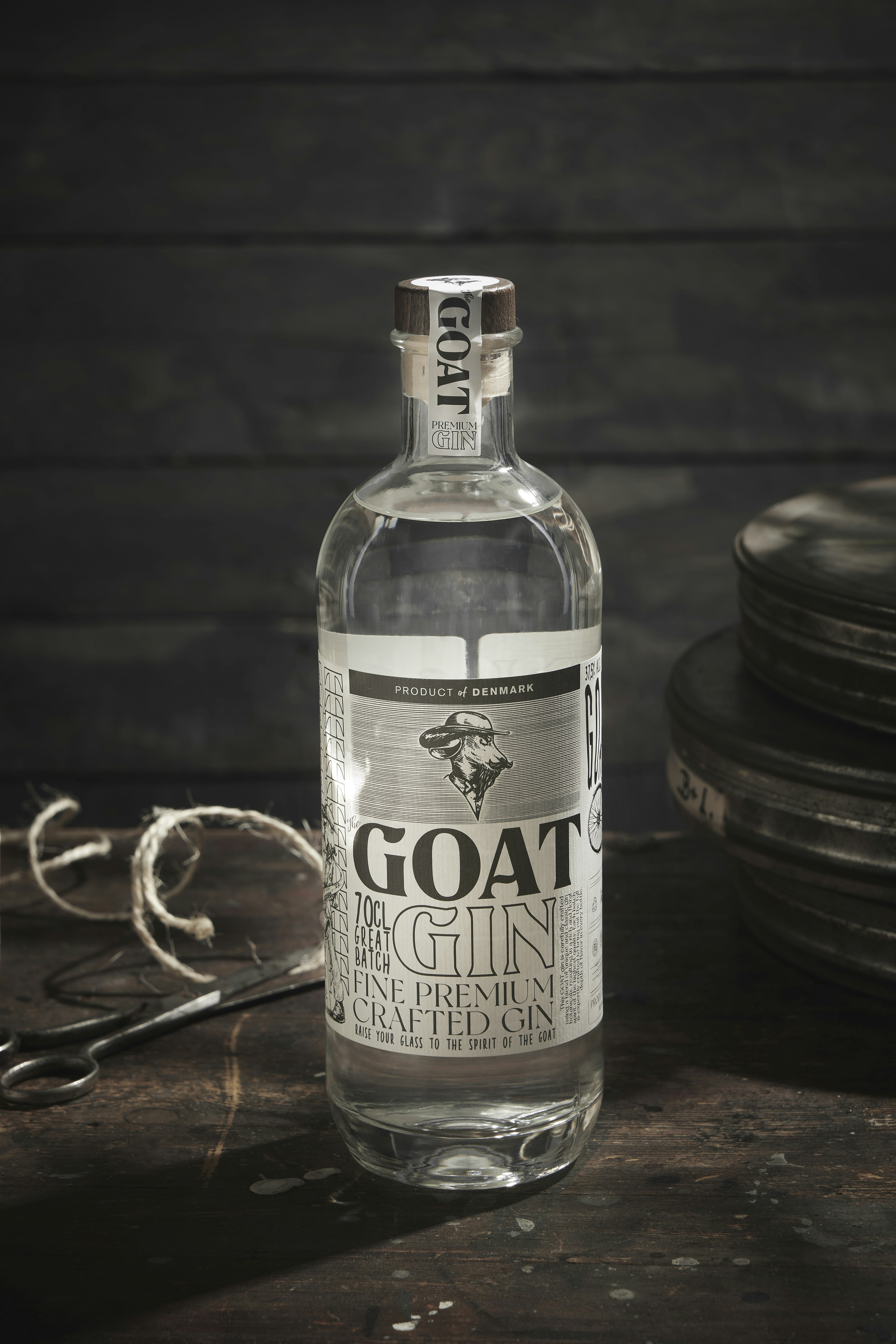 A bottle of goat gin on a table