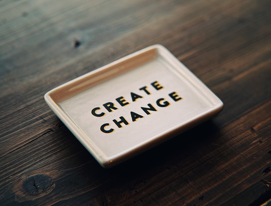 A white tray with the words create change written on it,