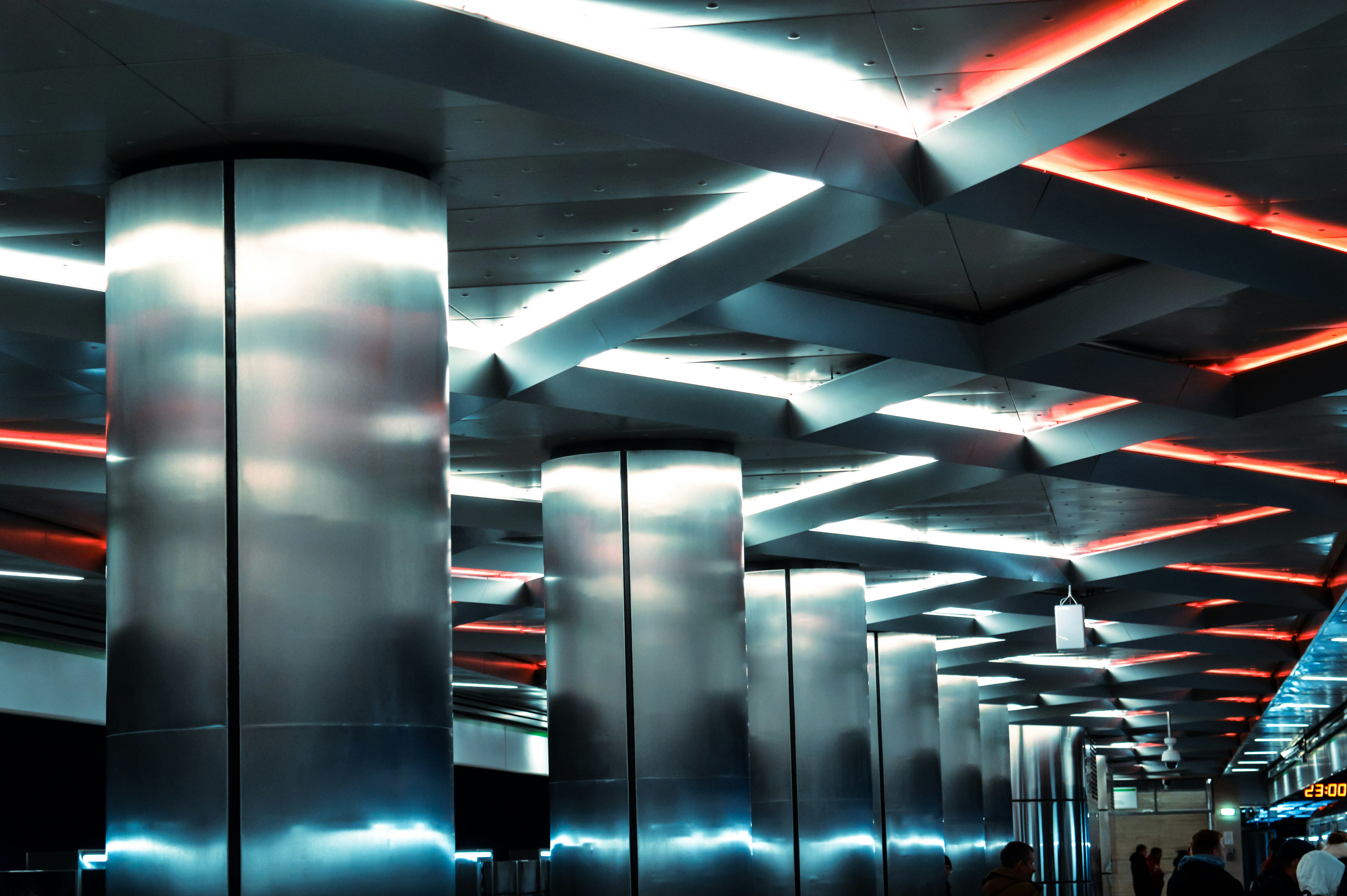 A glowing corridor of data center lights stretching into the distance
