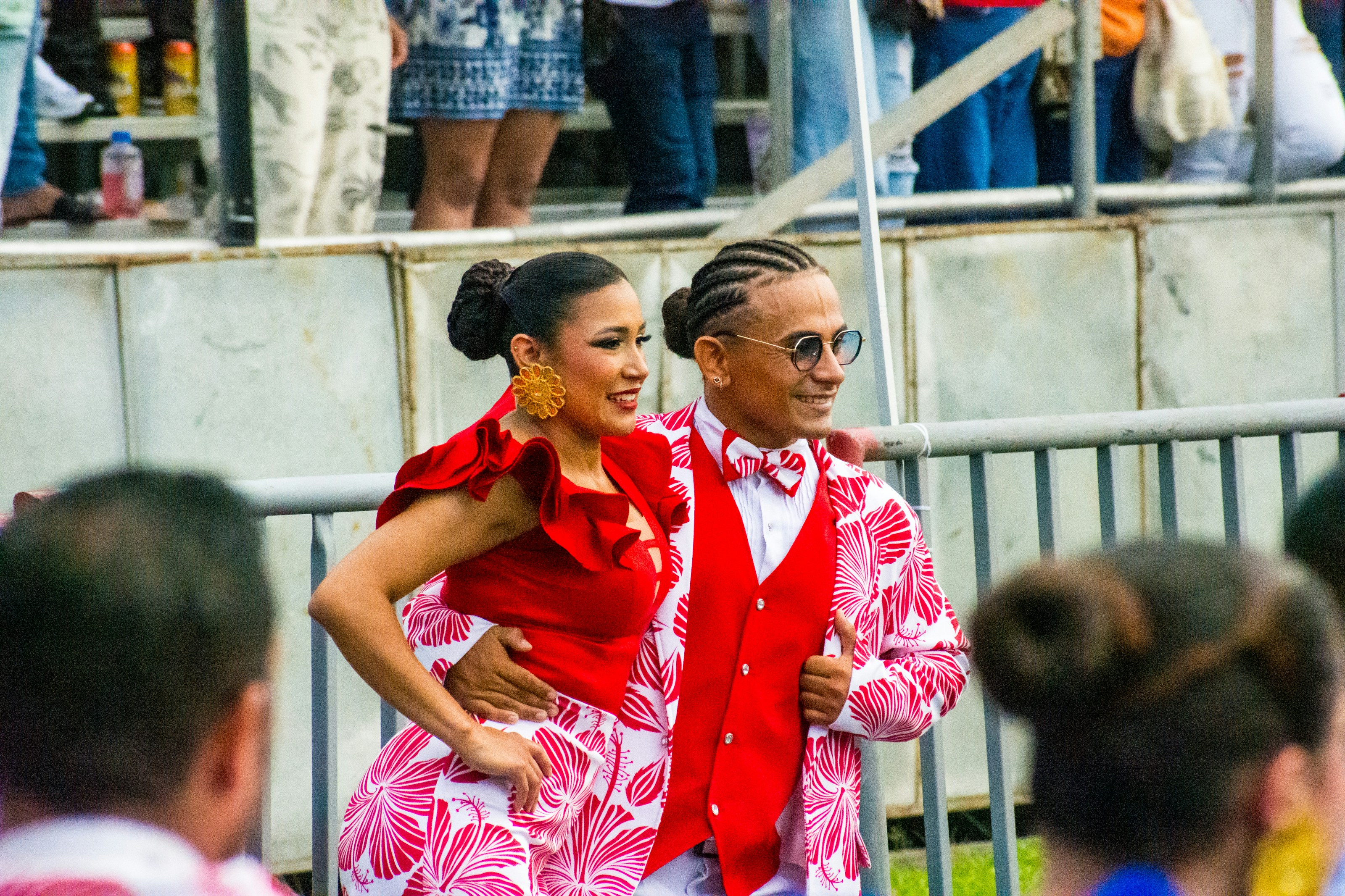 A couple of people standing next to each other