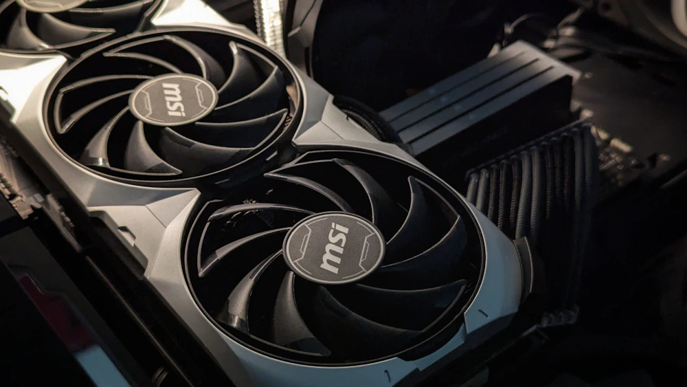 Close-up of a modern graphics card and cooling fans