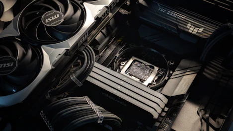 The inside of a computer with many wires