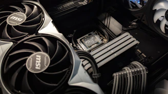 A close up of a computer case with fans